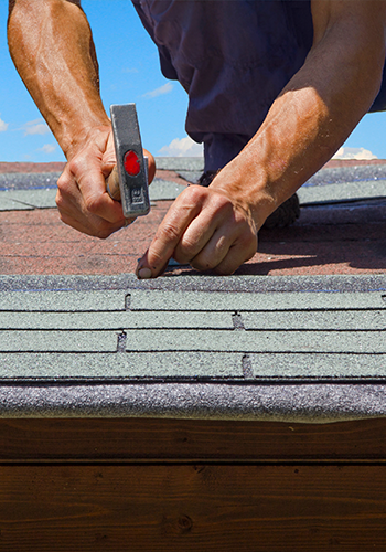 Man Working on Roof